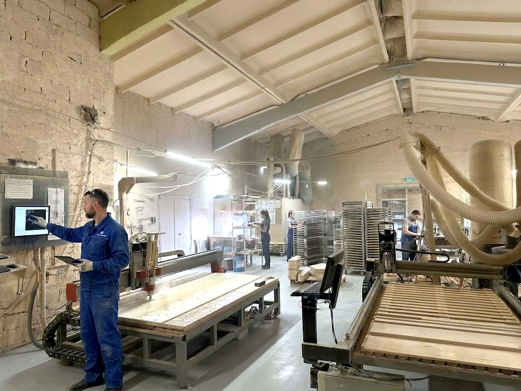 Operator at the CNC router, Maluma Toys workshop in Lviv